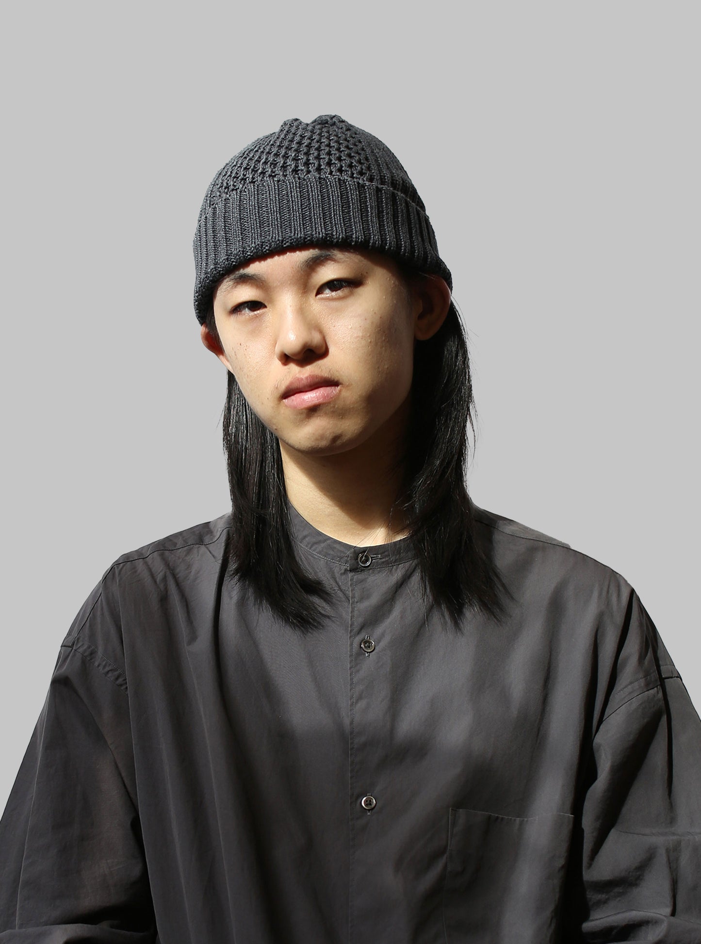 Rototo Cotton Aran Cable Indigo Rollup Beanie (Black Denim)