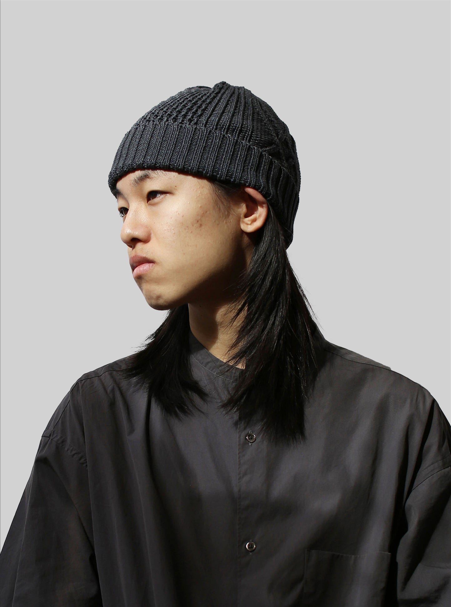 Rototo Cotton Aran Cable Indigo Rollup Beanie (Black Denim)