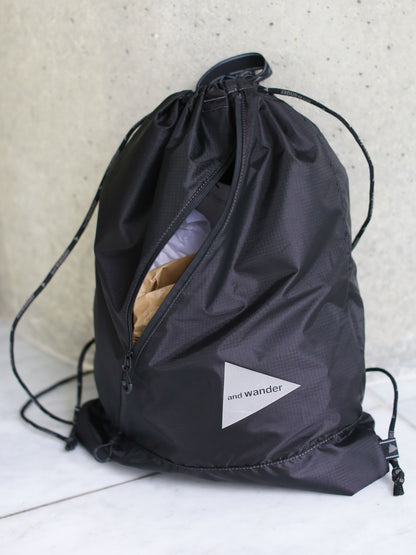 And Wander Crsip Rip Drawstring Bag - Black