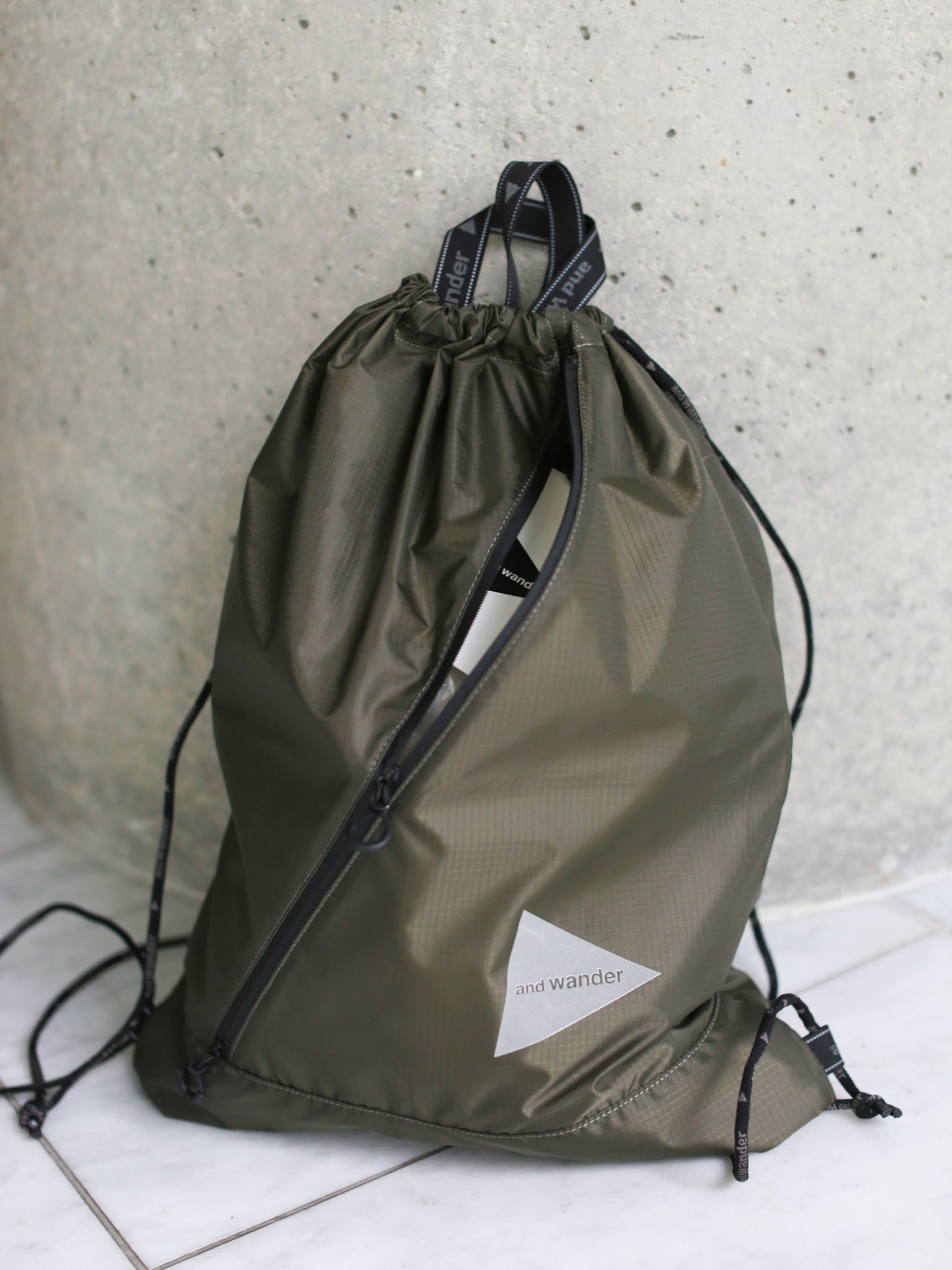 And Wander Crsip Rip Drawstring Bag - Khaki